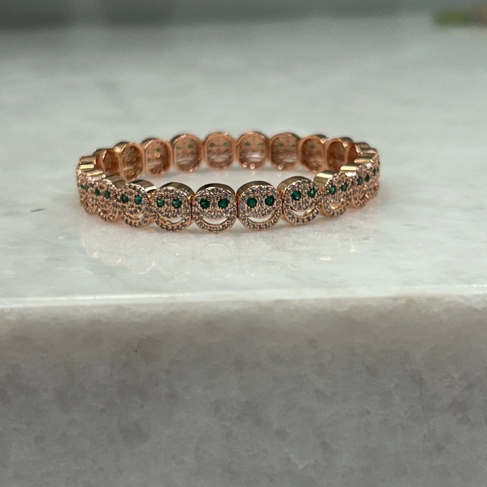 Gold and Green Eternity Bracelet with Bezel Set Gems
